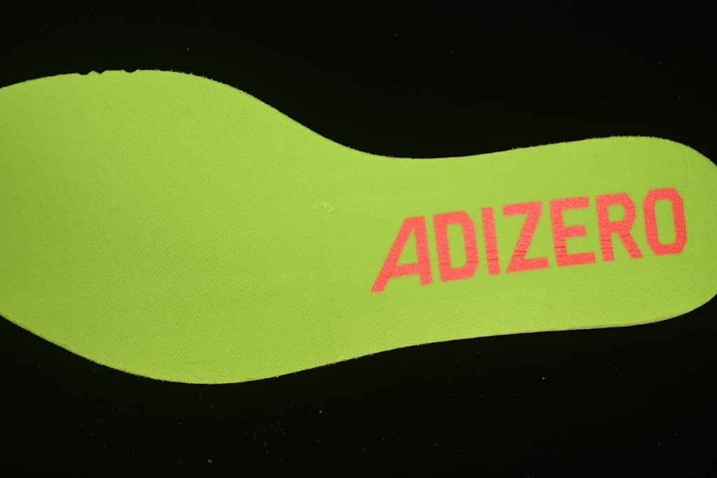 Lime-colored insole with Adizero lettering