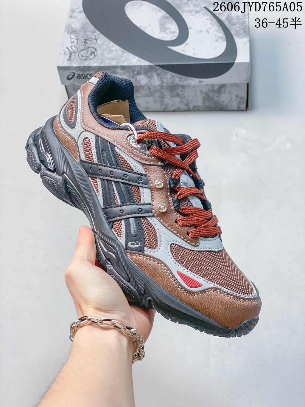 Side view of a brown and rust ASICS GEL-SD Lyte UB12-S sneaker