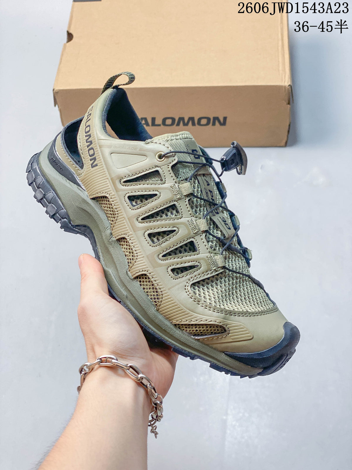 Side view of an olive Salomon XA Pro 3D Amphib sneaker with cord closure