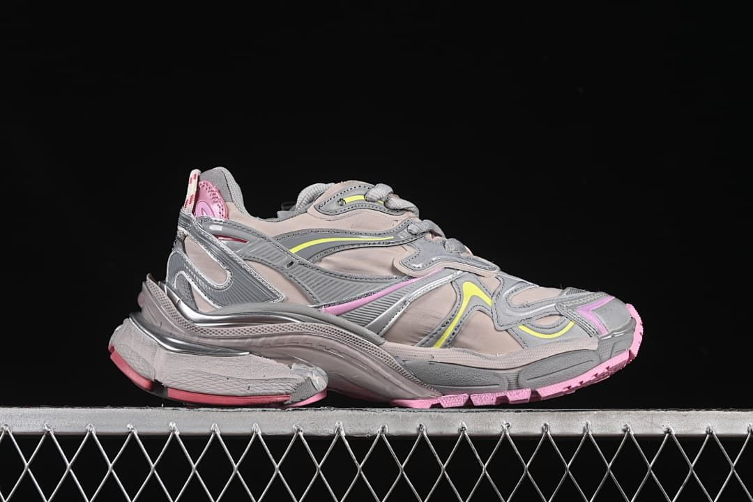 Side profile highlighting the layered upper, sculpted sole, and accent colors.