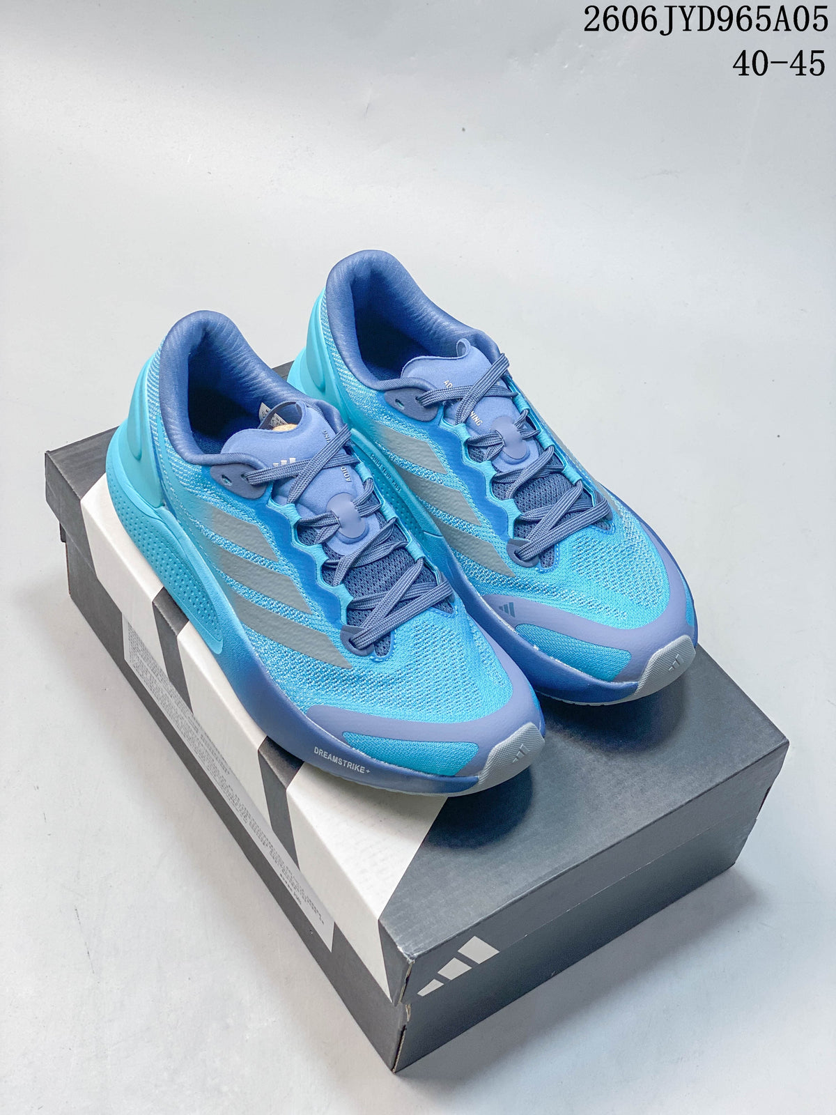 Blue Adidas Cushionnova running shoes displayed on a shoebox.