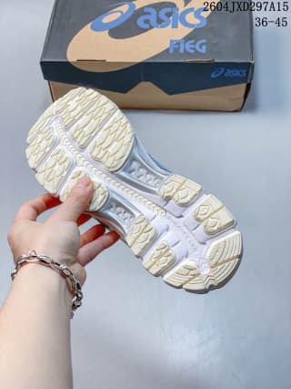 Outsole view showing the segmented rubber tread pattern and contrasting sole sections.