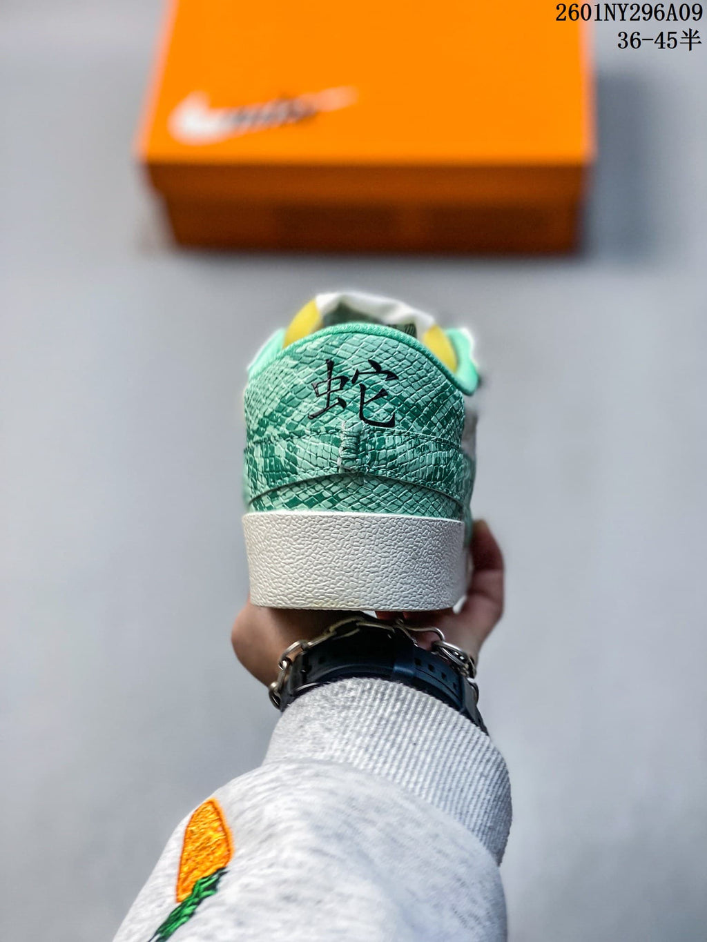 Rear view of the sneaker with a green patterned heel panel.