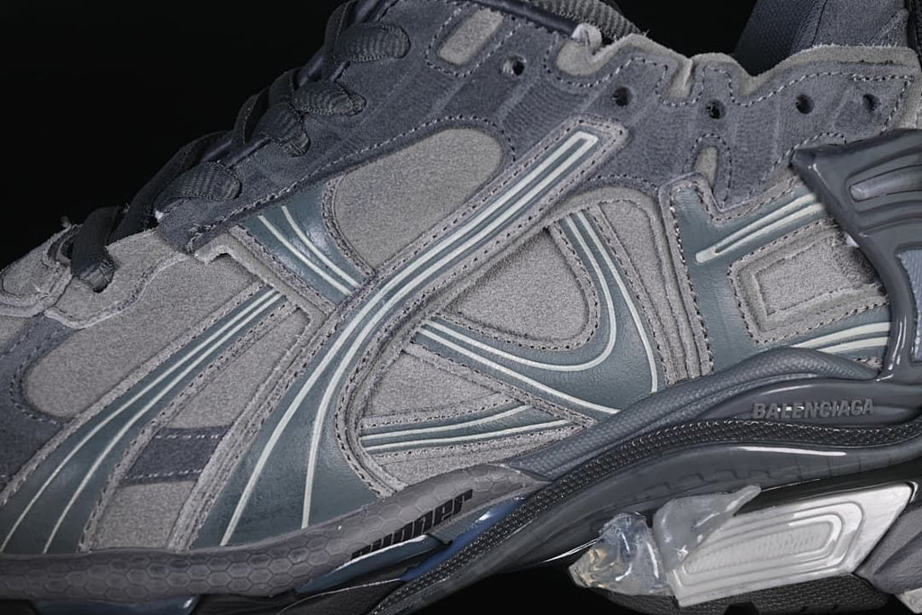 Close-up of layered grey panels and contrast side detailing