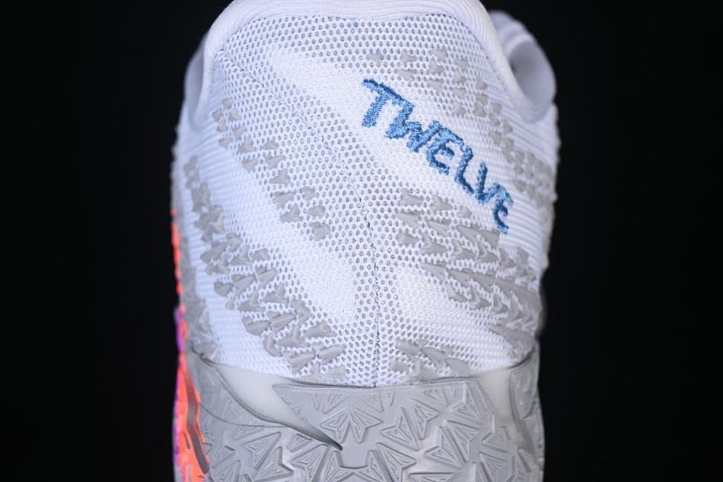 Heel view with patterned upper and blue lettering