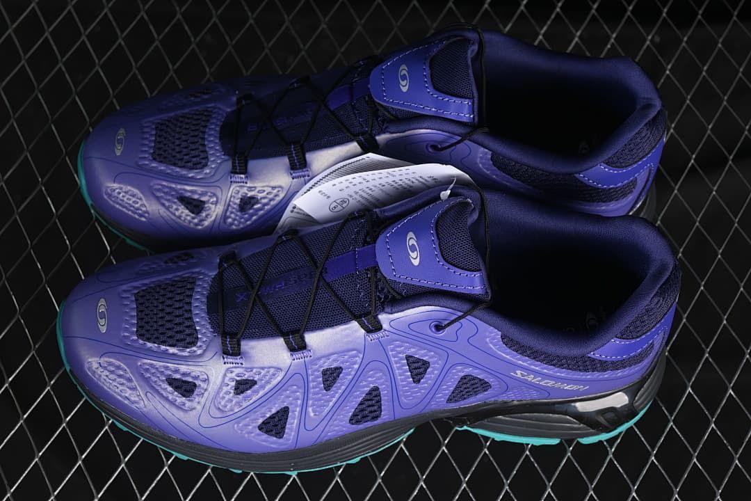 Pair of purple shoes shown from above at an angle.