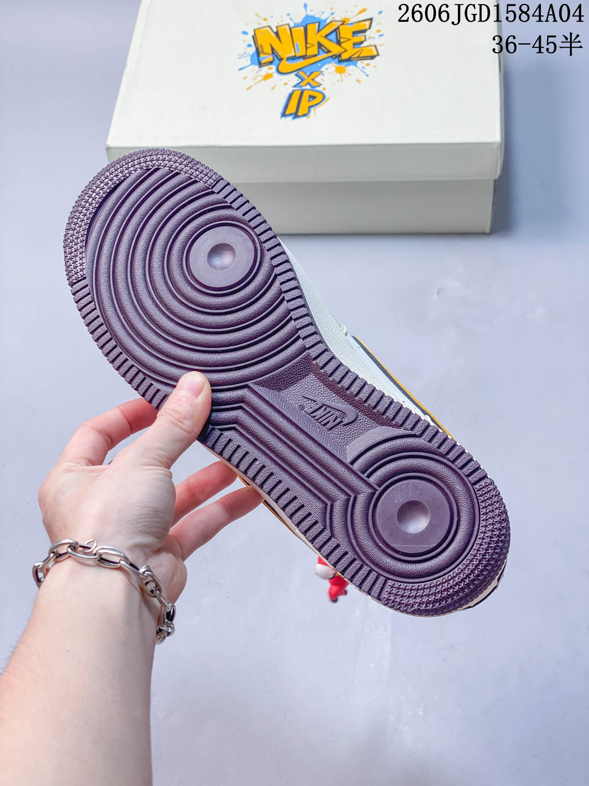 Outsole view of the sneaker with a dark burgundy tread