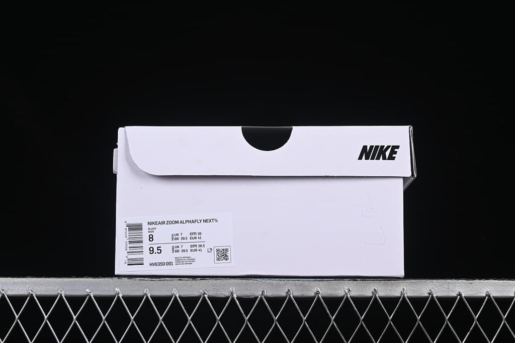 Nike shoe box showing product name, style code, and size label