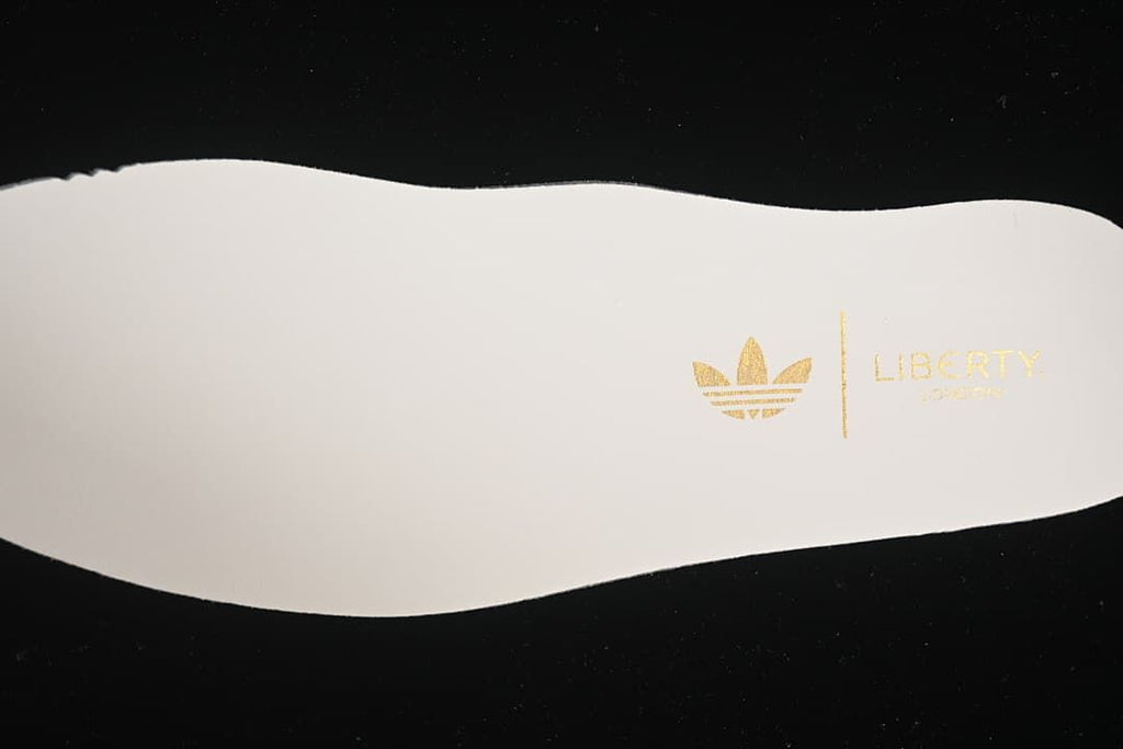 Insole with gold-tone adidas Trefoil and Liberty marking