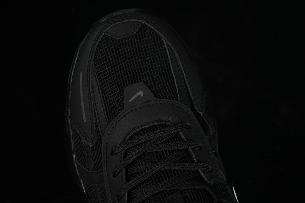 Top-down close-up of the toe box and lacing.
