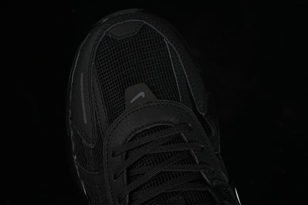 Top-down close-up of the toe box and lacing.