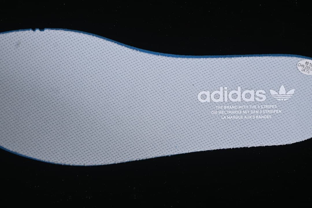 Close-up of the textured insole with adidas branding