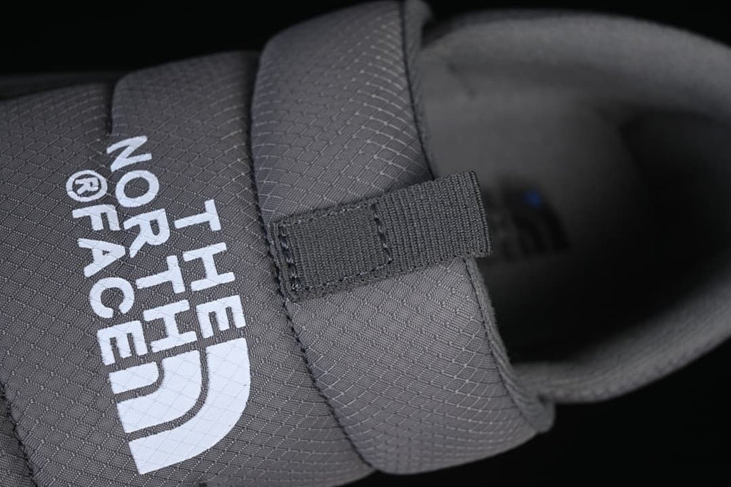 Close-up of the wide instep strap and logo