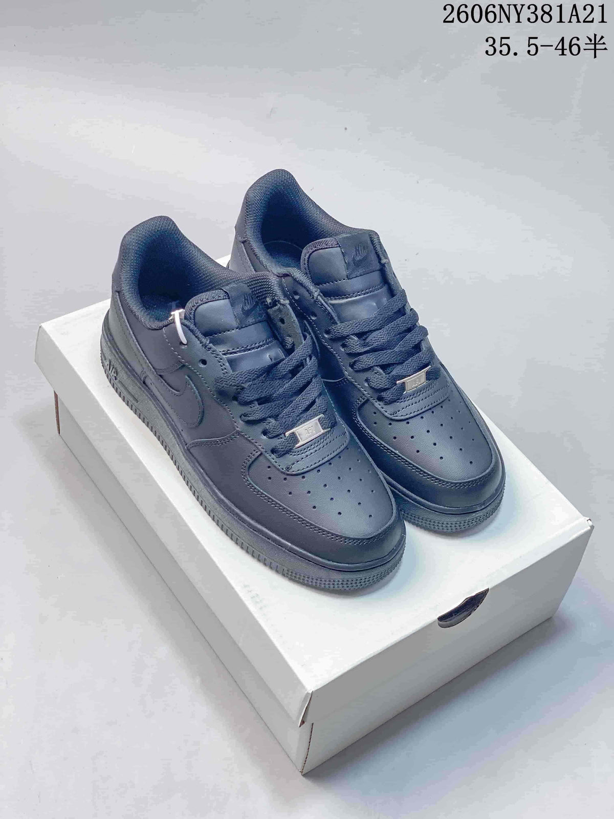 Dark navy Nike Air Force 1 low-top sneakers with matching laces