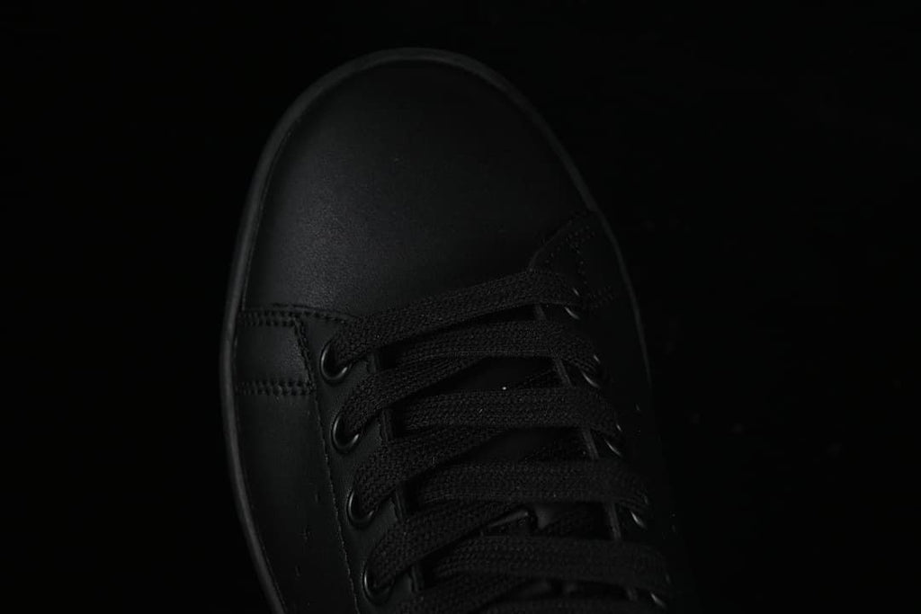 Top-down close-up of the rounded toe and black laces