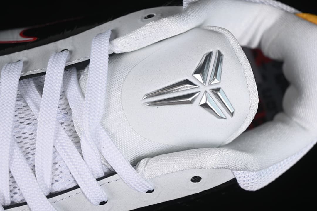 Close-up of the shoe tongue with a metallic Kobe logo