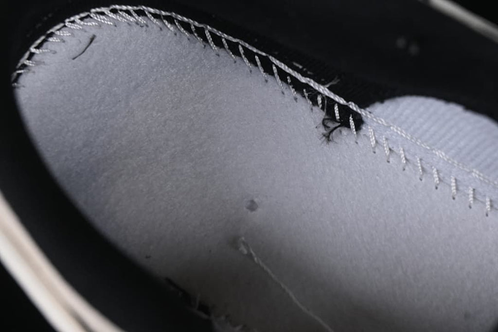 Close-up of the sneaker's interior lining and stitching