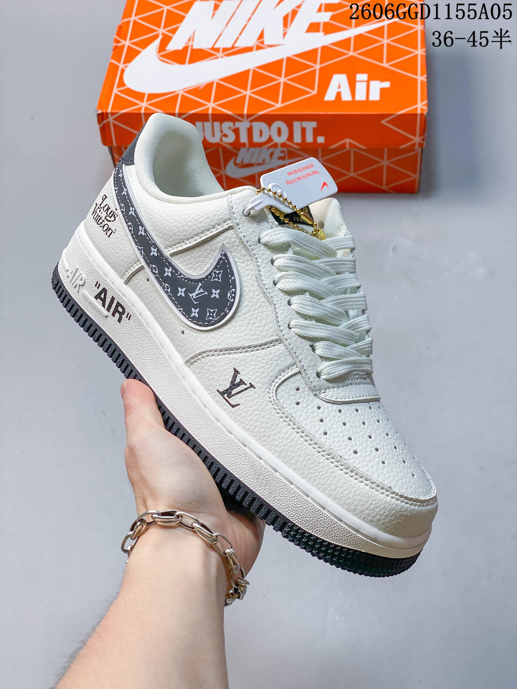 Angled side view of the sneaker showing patterned panels, printed details, and a dark outsole.