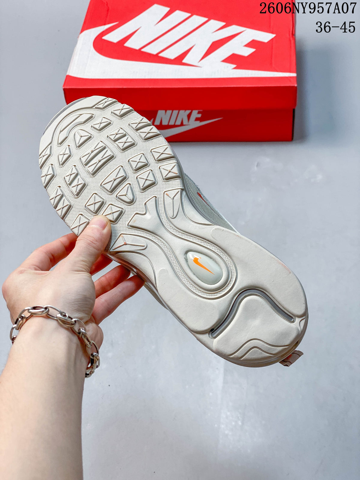 Outsole of a beige Nike Air Max 97 sneaker with size range text visible in the image