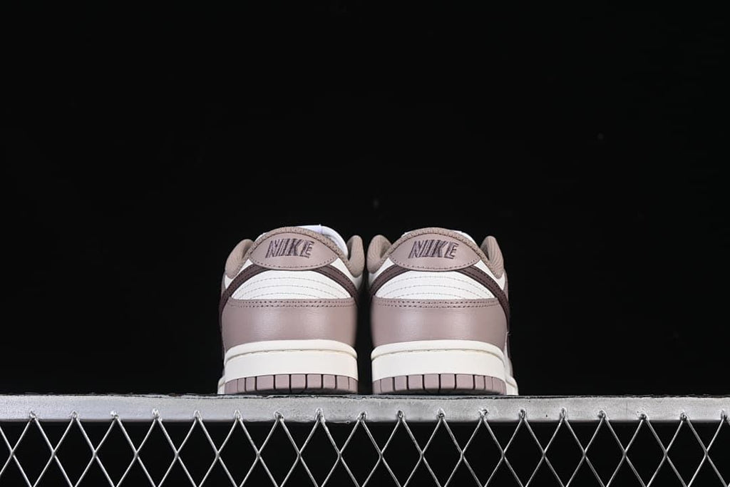 Rear view of the pair showing heel panels and branding.