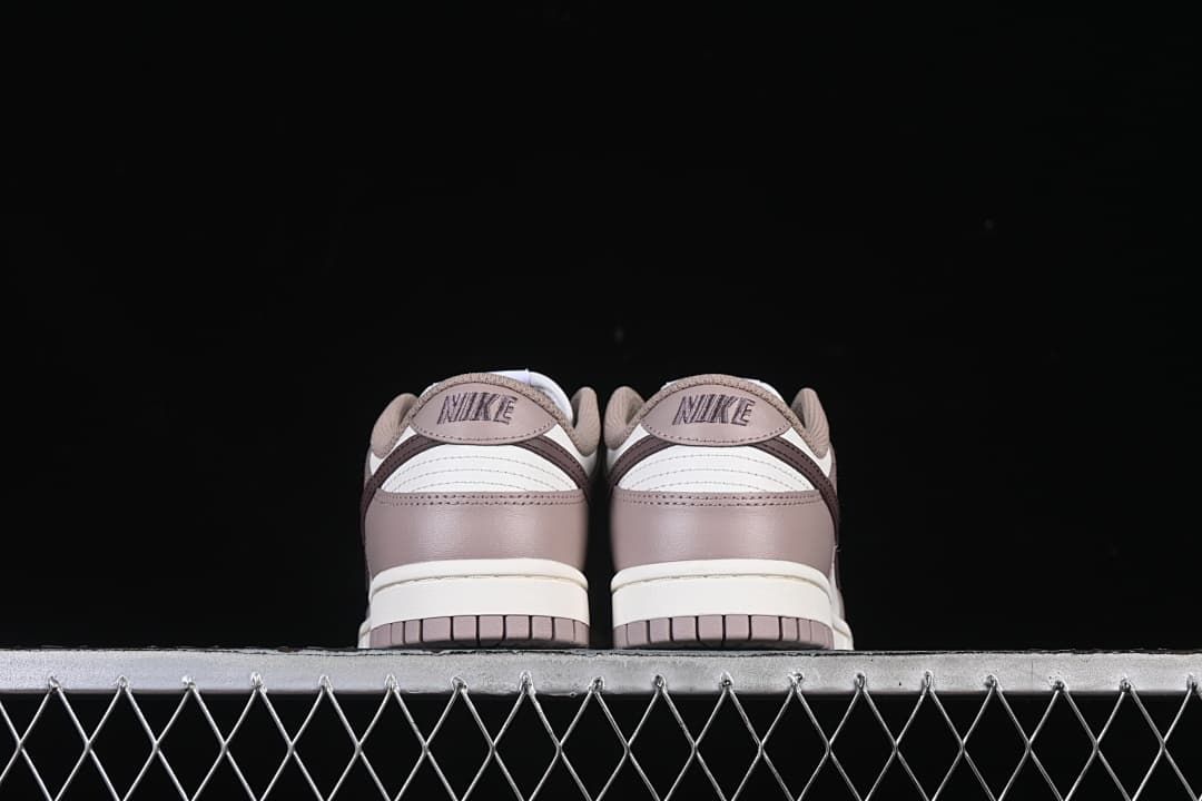 Rear view of the pair showing heel panels and branding.