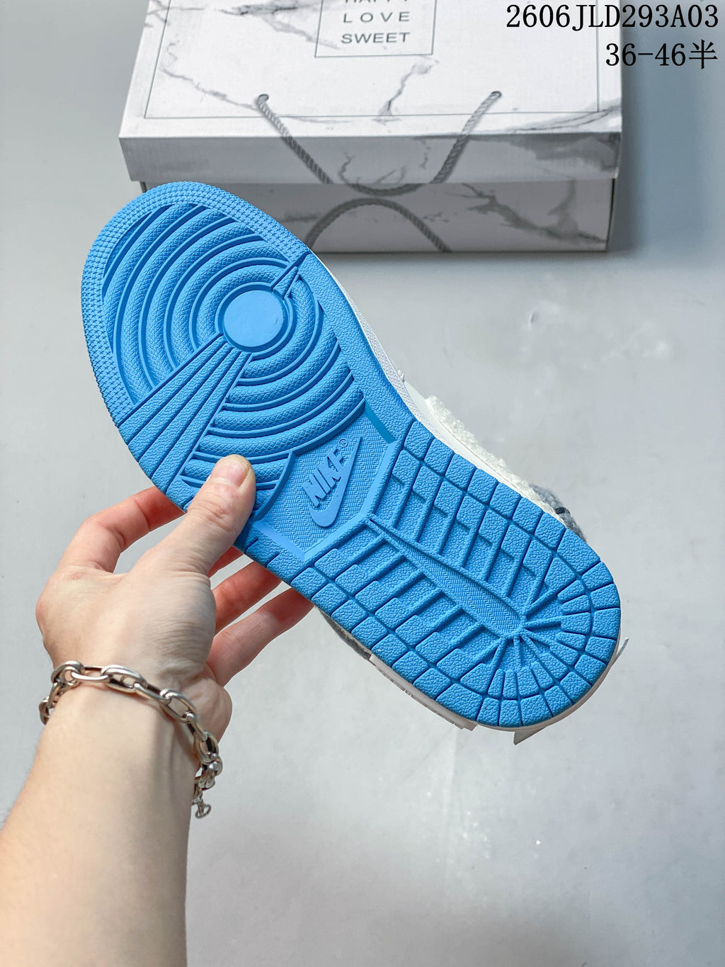Bright blue outsole with molded tread pattern