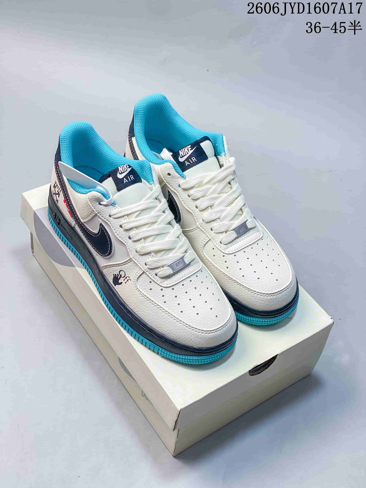 Pair of white Nike Air Force 1 ’07 low-top sneakers with navy and turquoise accents