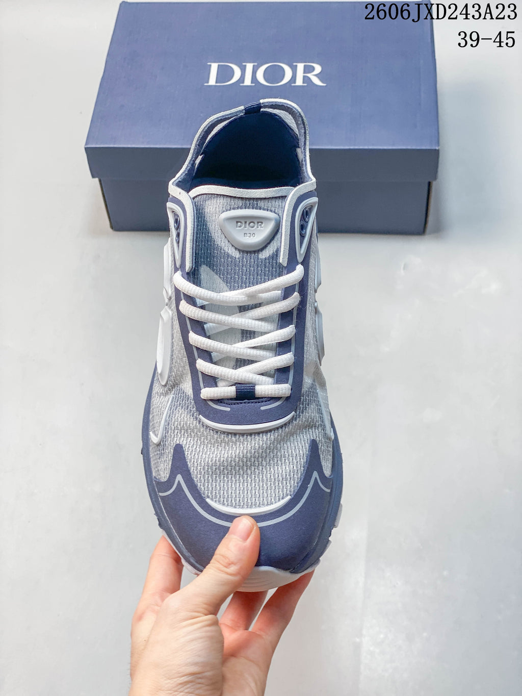 Top view of the sneaker showing its laces and gray-blue color blocking
