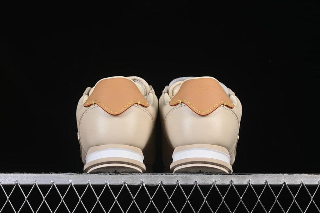 Rear view of the pair showing tan heel accents