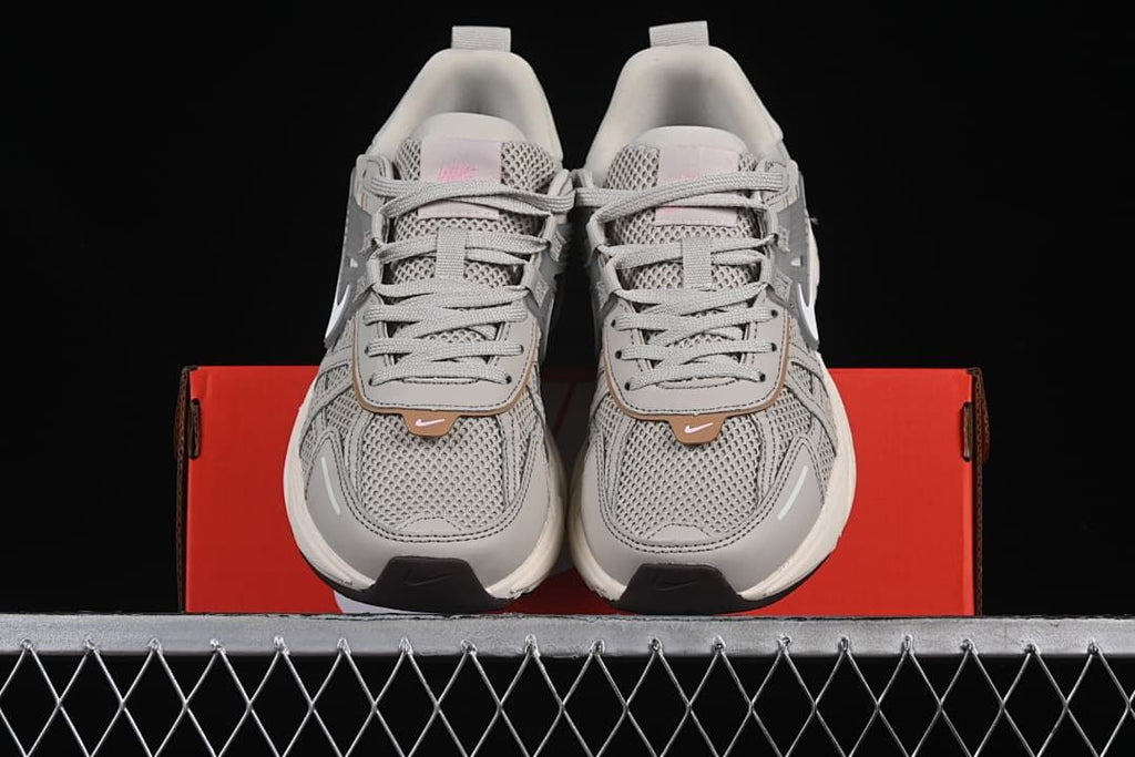 Front view of the pair displayed on a red shoebox