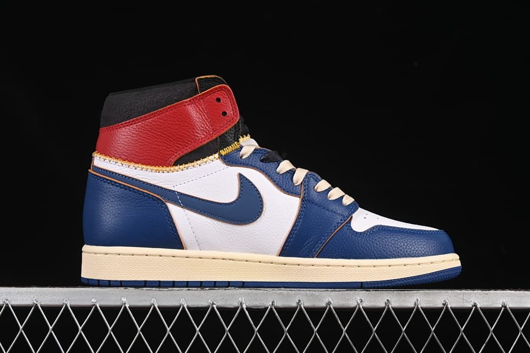 Side profile highlighting layered white and blue panels with red collar