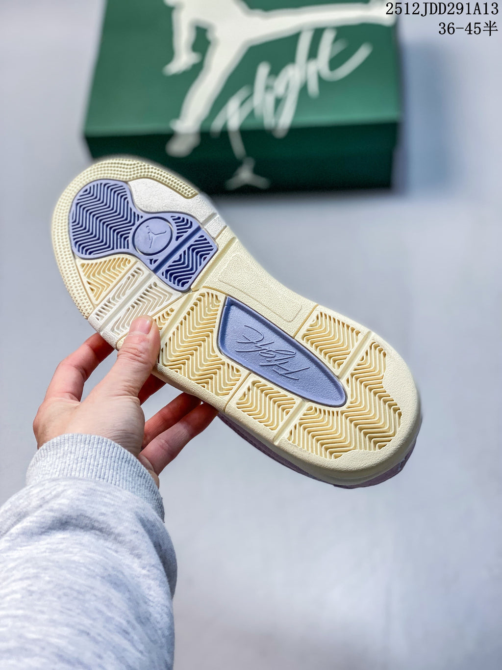 Close-up of the patterned outsole with lavender and cream-colored sections