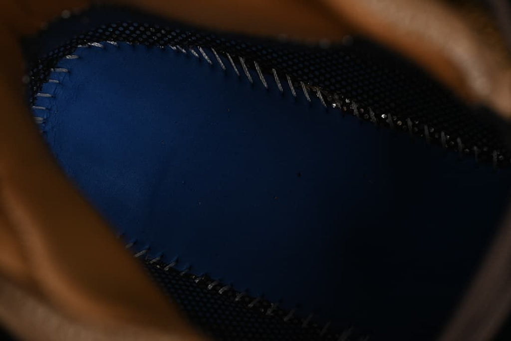 Close-up inside the shoe showing a blue footbed