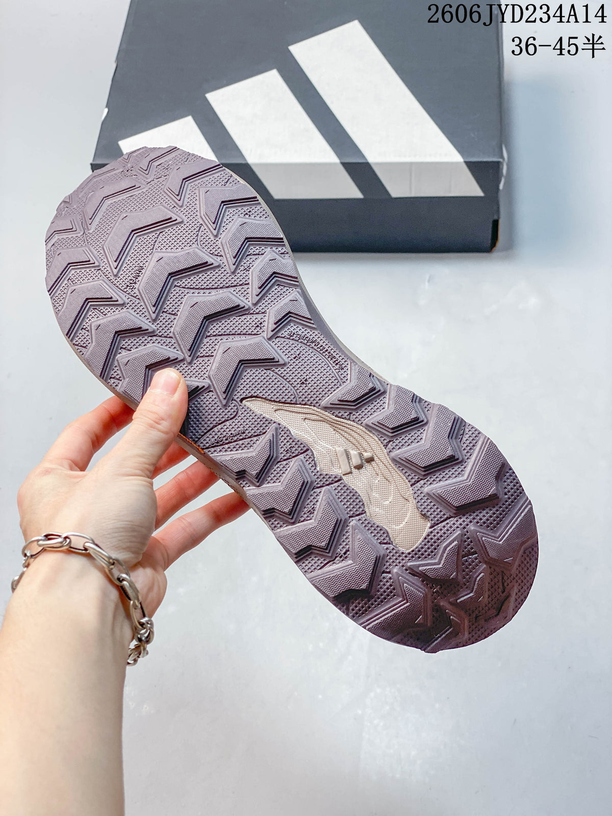 Close-up of the geometric tread pattern on the Adidas Holo Peak outsole