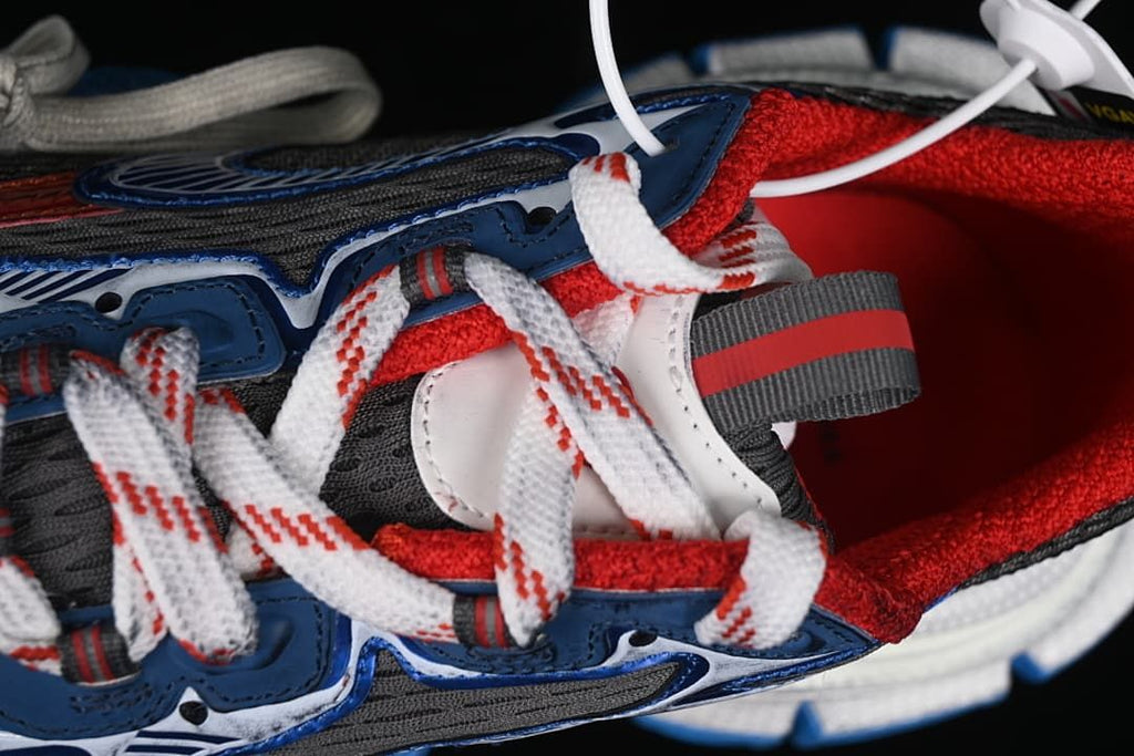 Close-up of the patterned laces and red interior lining
