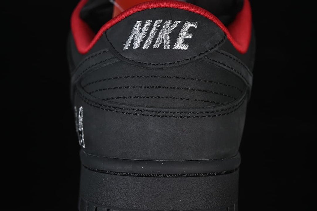 Rear view of the black sneaker with Nike heel embroidery