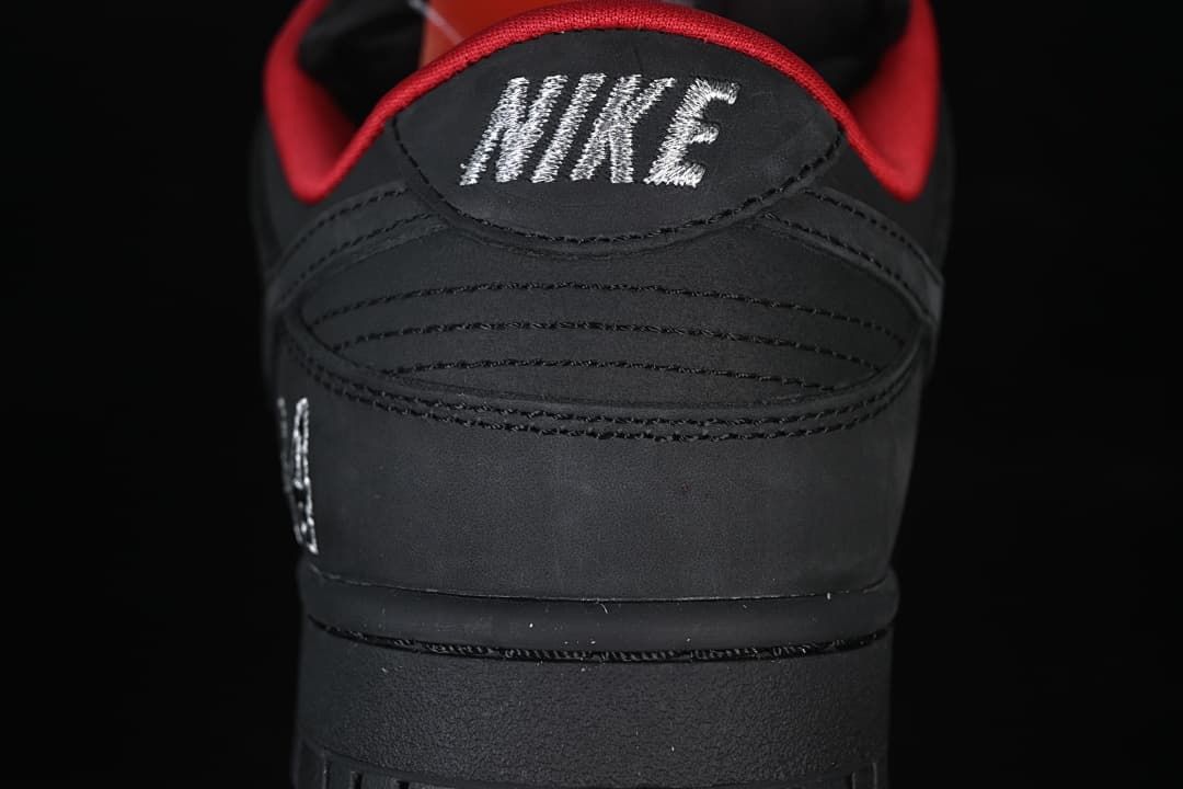 Rear view of the black sneaker with Nike heel embroidery