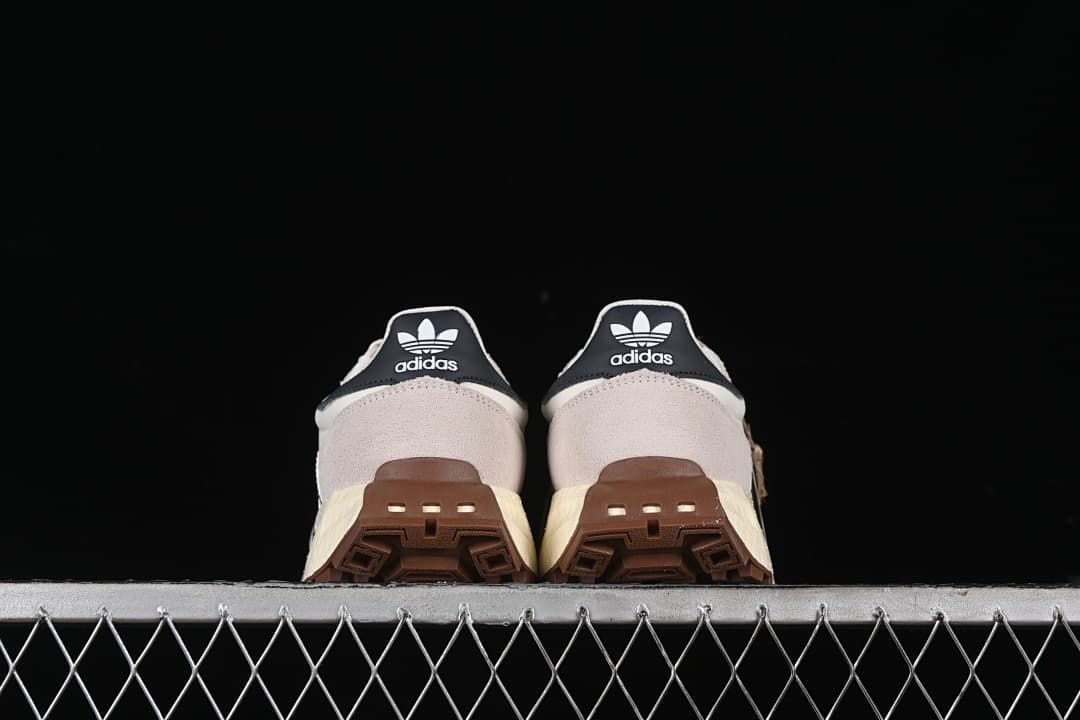 Rear view of both sneakers showing heel details and gum outsoles.