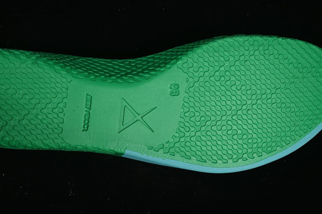 Close-up of the green patterned shoe outsole
