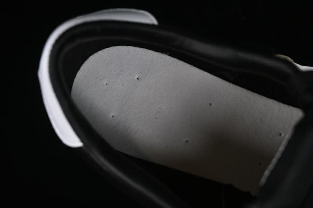 Close-up inside the sneaker showing the footbed.