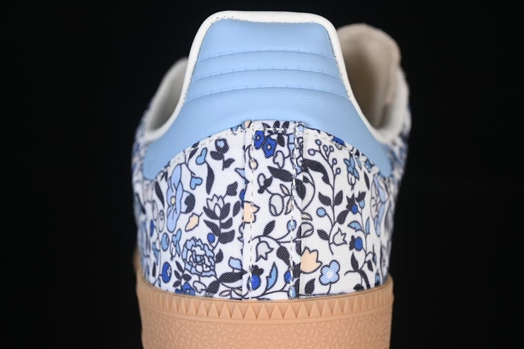 Rear view showing the floral-print heel and light blue heel detail