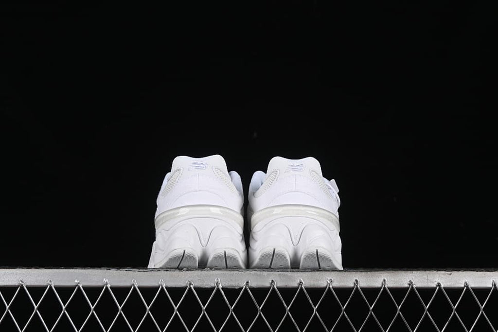 Pair of sneakers viewed from the back.