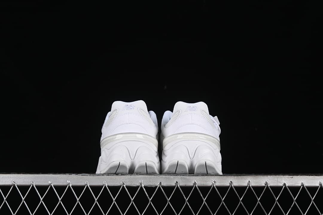Pair of sneakers viewed from the back.