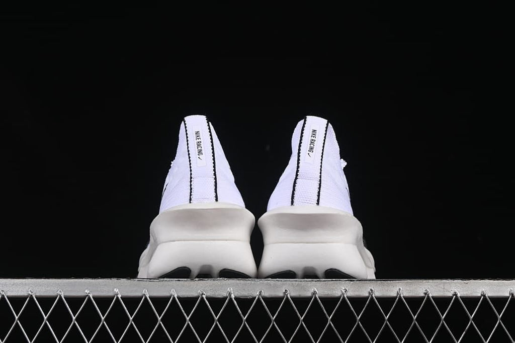 Rear view of the pair showing heel tabs and soles