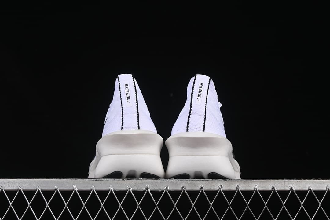 Rear view of the pair showing heel tabs and soles