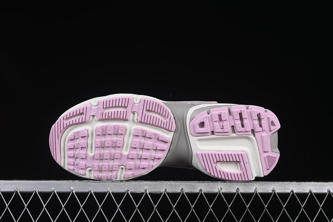 Underside view of the pink and white patterned outsole