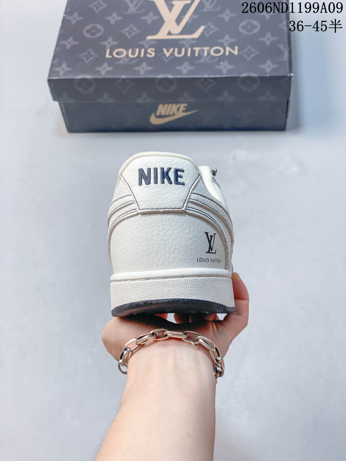 Rear view of the sneaker showing heel details and branding