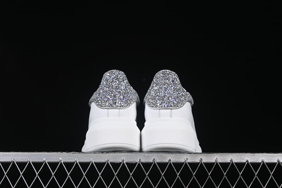 Rear view of the pair highlighting the glitter heel panels.