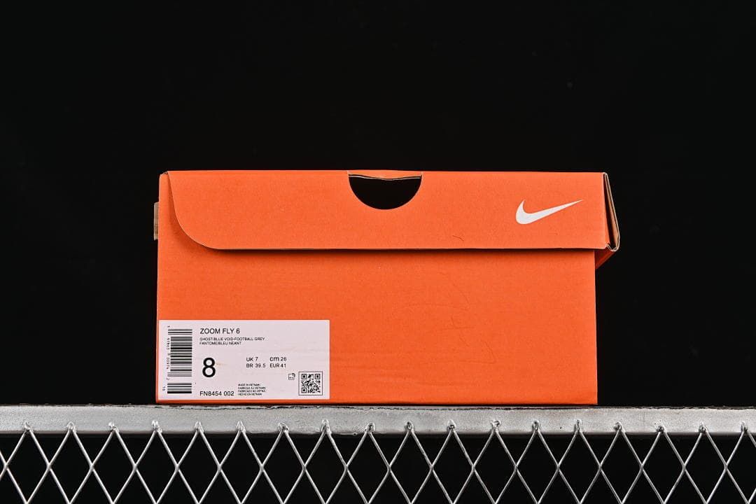 Orange Nike shoebox with a product label showing Zoom Fly 6, style FN8454 002, and EU 41.