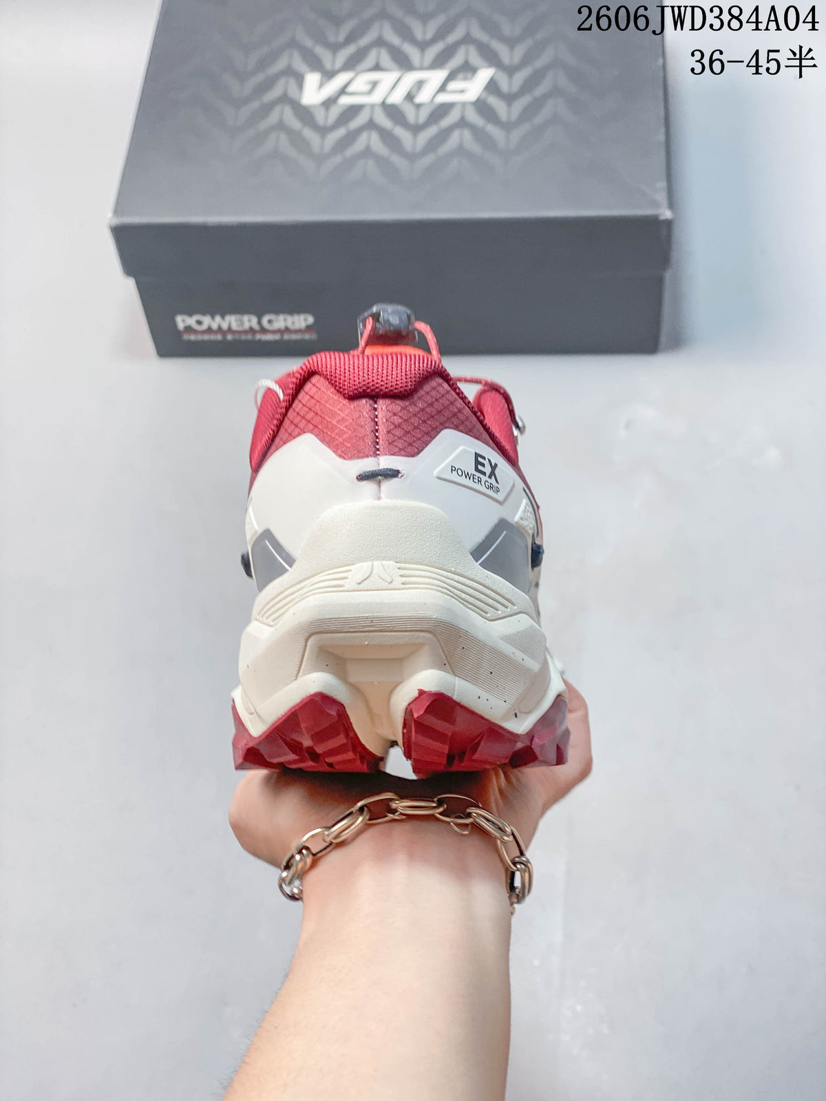 Rear view of a trail shoe showing the heel construction and burgundy outsole lugs.